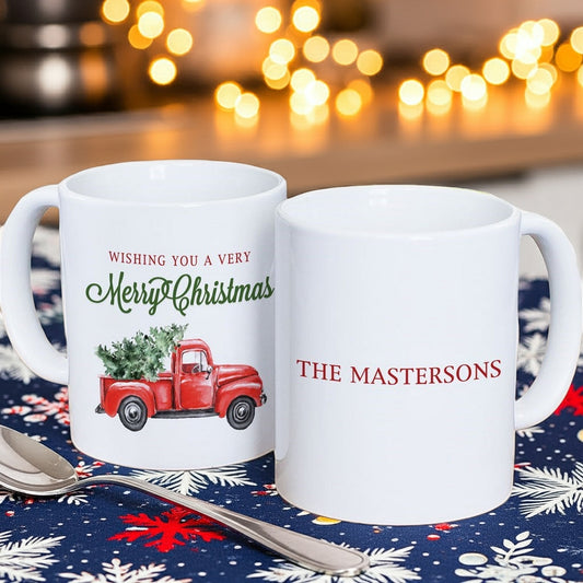 Personalized Christmas mug featuring red truck design and customizable text for holiday celebrations