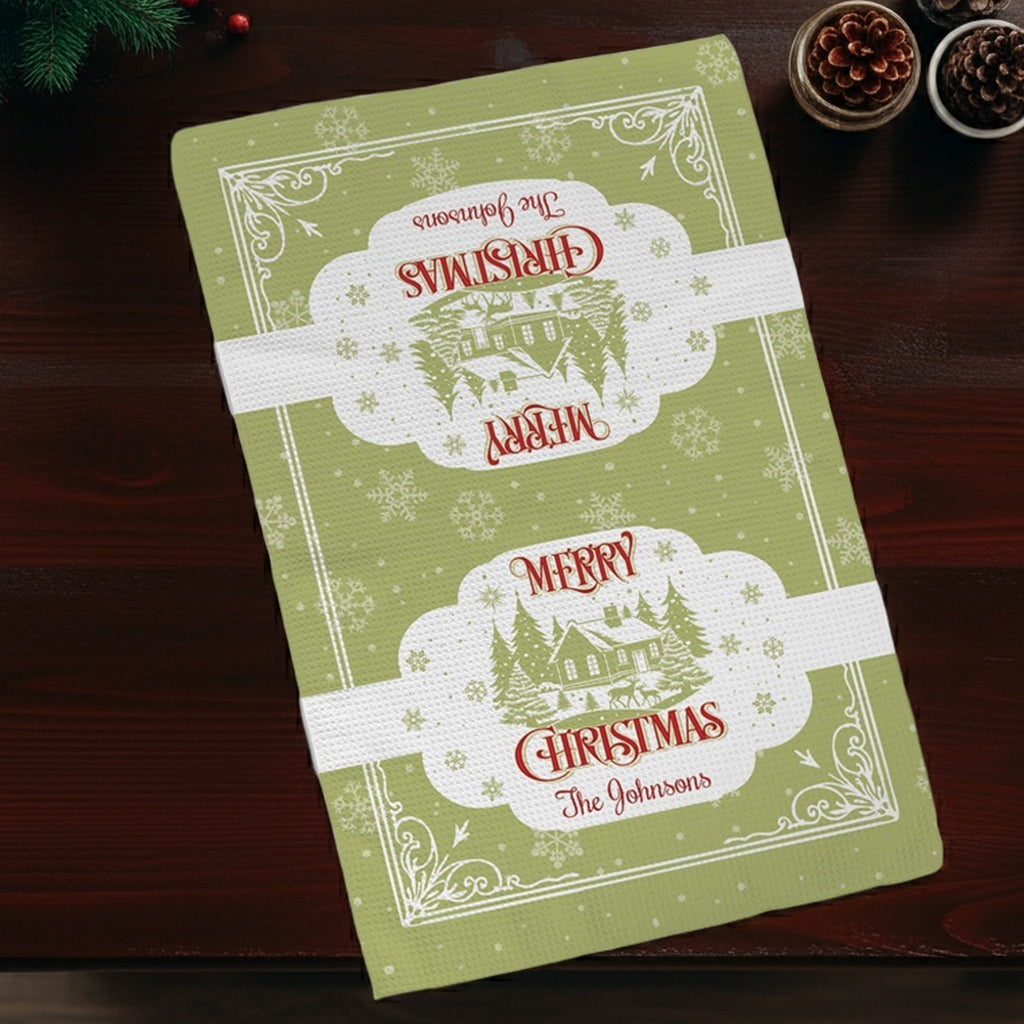 Personalized Christmas waffle weave kitchen towel in green featuring festive design and custom name print