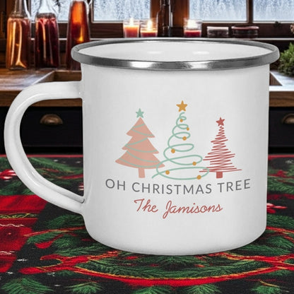 Personalized enamel Christmas mug featuring holiday trees and the name The Jamisons