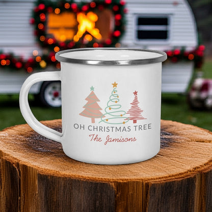 Personalized enamel Christmas mug featuring colorful trees and the name The Jamisons