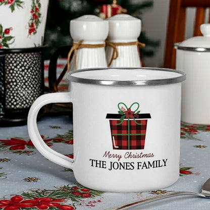 Personalized enamel Christmas mug featuring black and red plaid design and custom family name