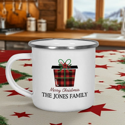 Personalized enamel Christmas mug featuring a Christmas present design and custom family name