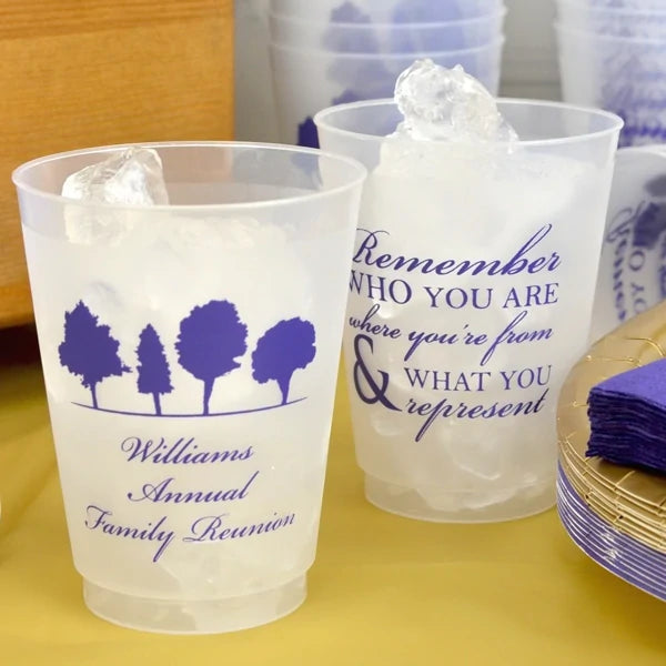 Clear frosted 16 oz. family reunion cups personalized with treest design and 3 lines of text on the front and remember who you are design on the back in dark purple violet print