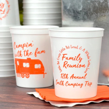 White 16 oz. stadium cups personalized with 'Whole Lotta Love' family reunion design with 2 lines of custom text on the front and 'Campin with the Fam' design on the back in orange imprint color