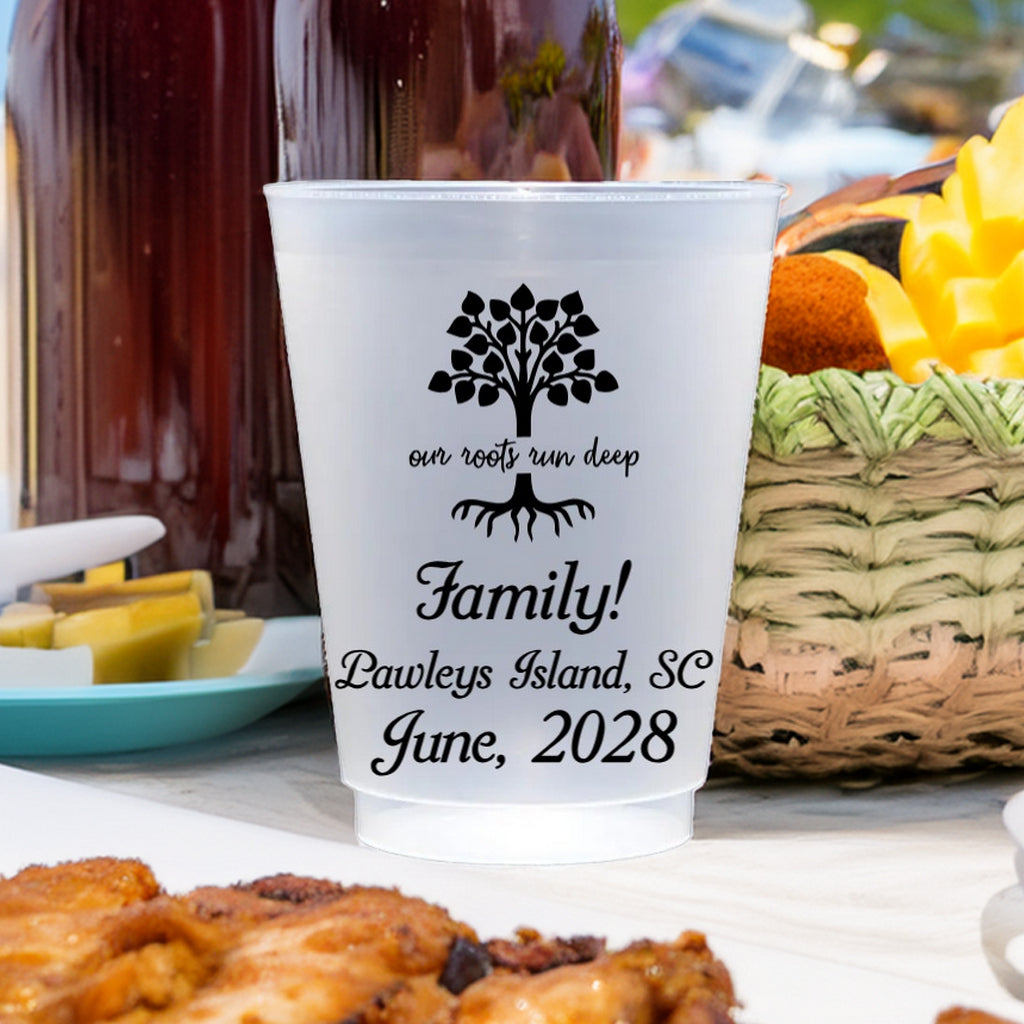 Personalized family reunion cups with tree design and event details from Tippytoad on picnic table