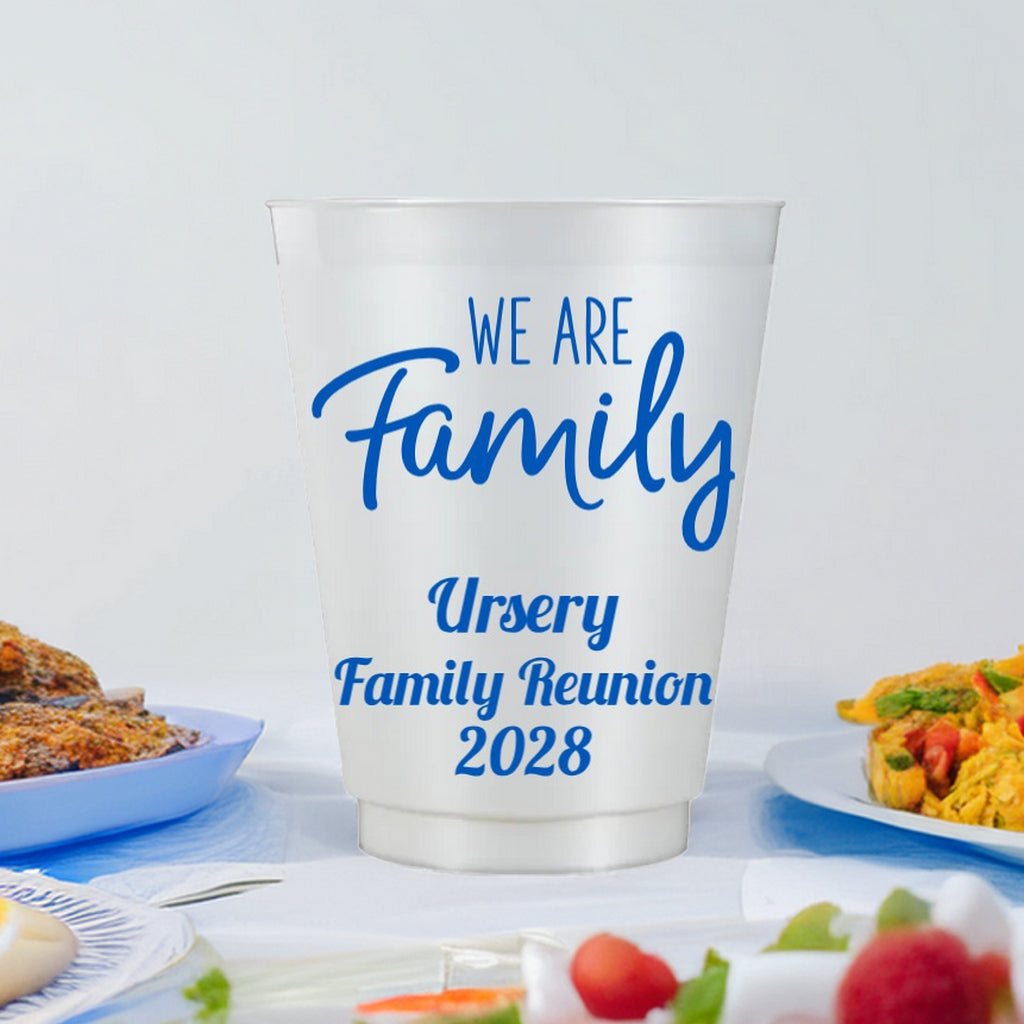 Personalized family reunion cups with blue text We Are Family Ursery Family Reunion 2028 on white cup