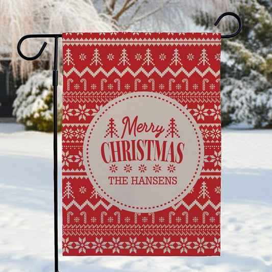 Personalized garden flag featuring a red Christmas design with 'Merry Christmas The Hansens' text
