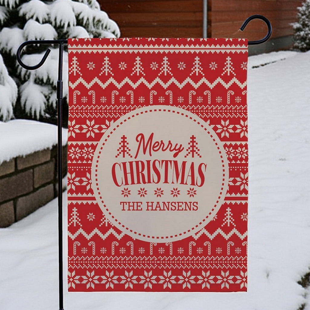 Personalized garden flag with Merry Christmas design and The Hansens name in festive red tones