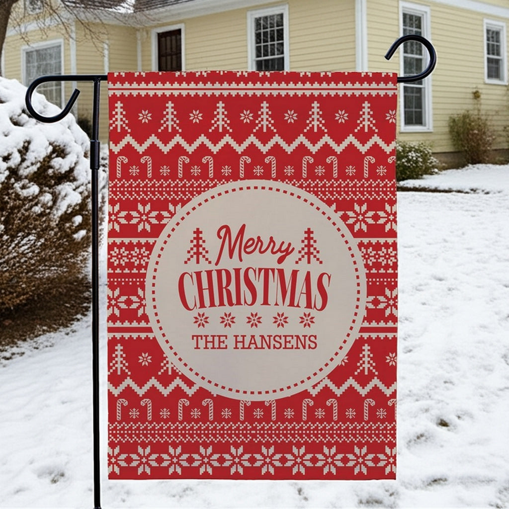 Personalized garden flag with a festive design reading Merry Christmas The Hansens for holiday decor