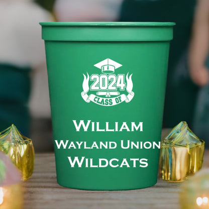 a green color graduation cup personalized with class of 2024 bold ribbon design with 3 lines of text in white print