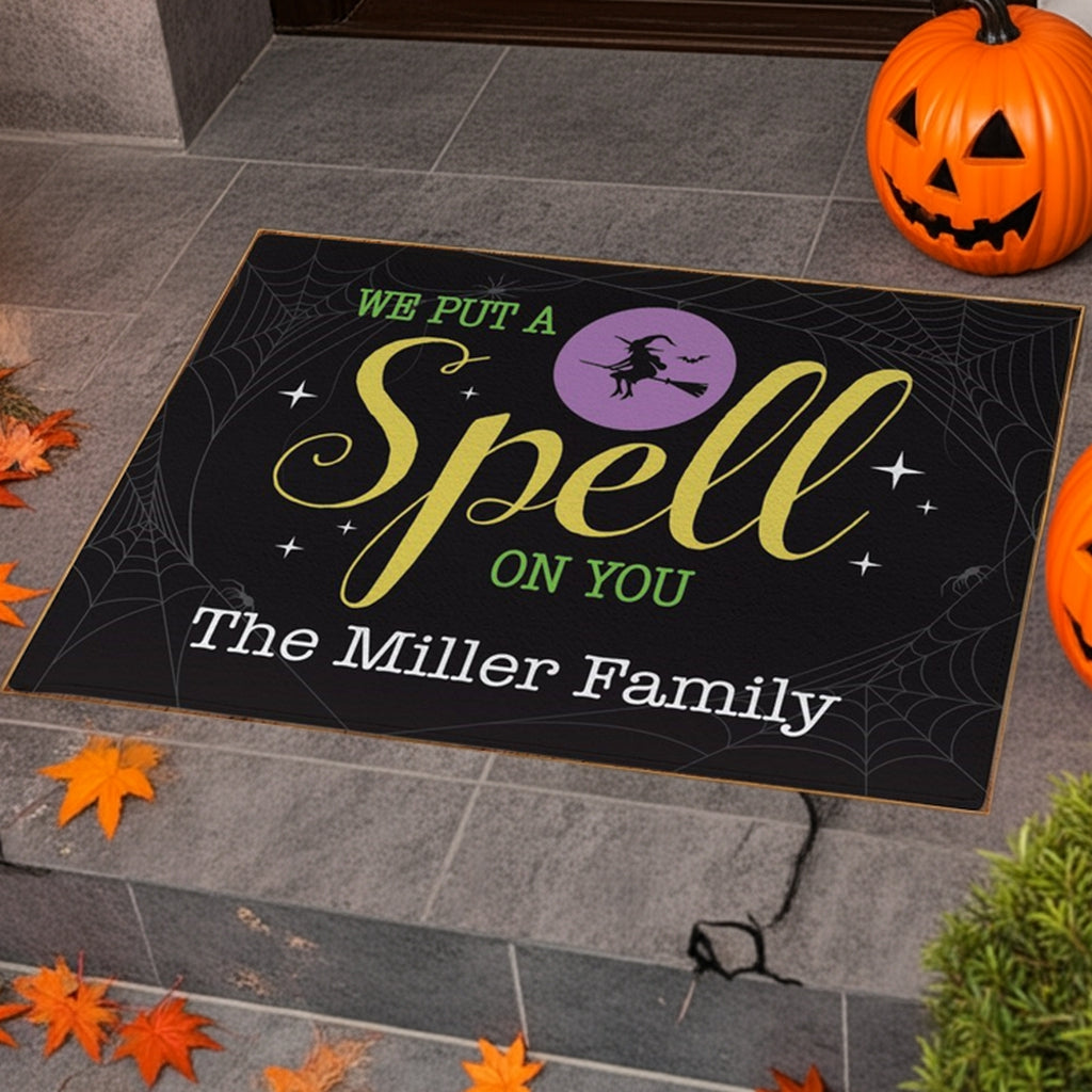 Personalized Halloween doormat with spell design and custom family name