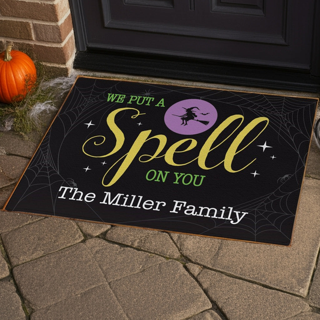 Personalized Halloween doormat with We Put A Spell On You text and witch design