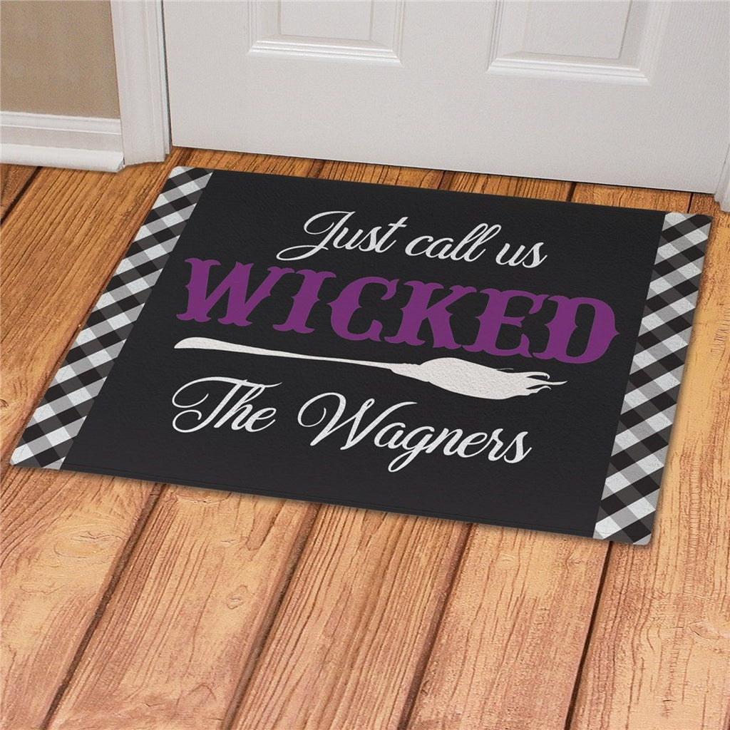 Personalized halloween doormat with Just call us Wicked text and plaid borders