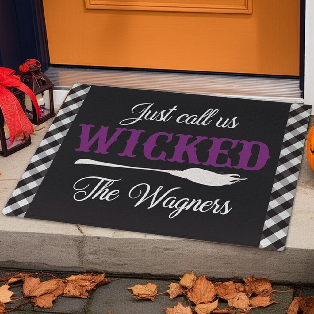 Personalized halloween doormat with black and white checkered edges and purple text saying Just call us Wicked