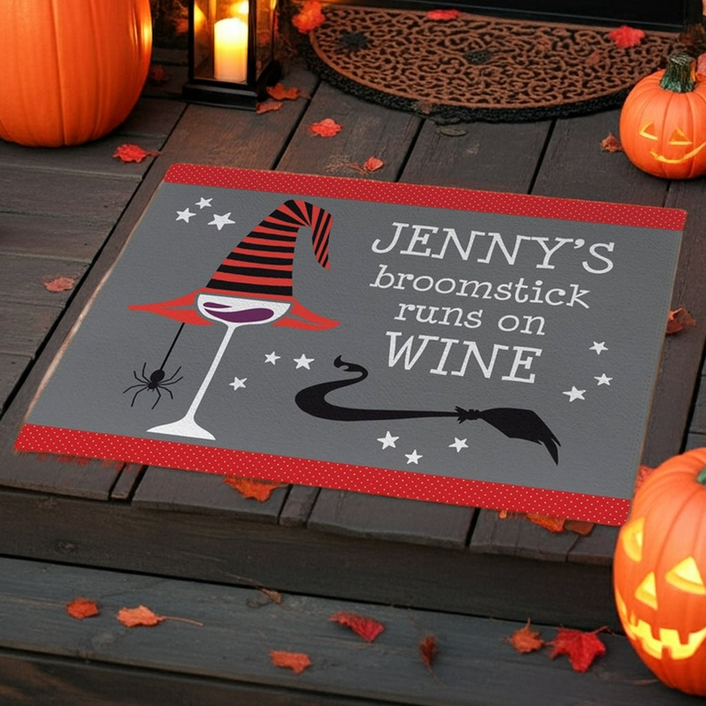 Personalized halloween doormat with witch hat and wine glass design on porch