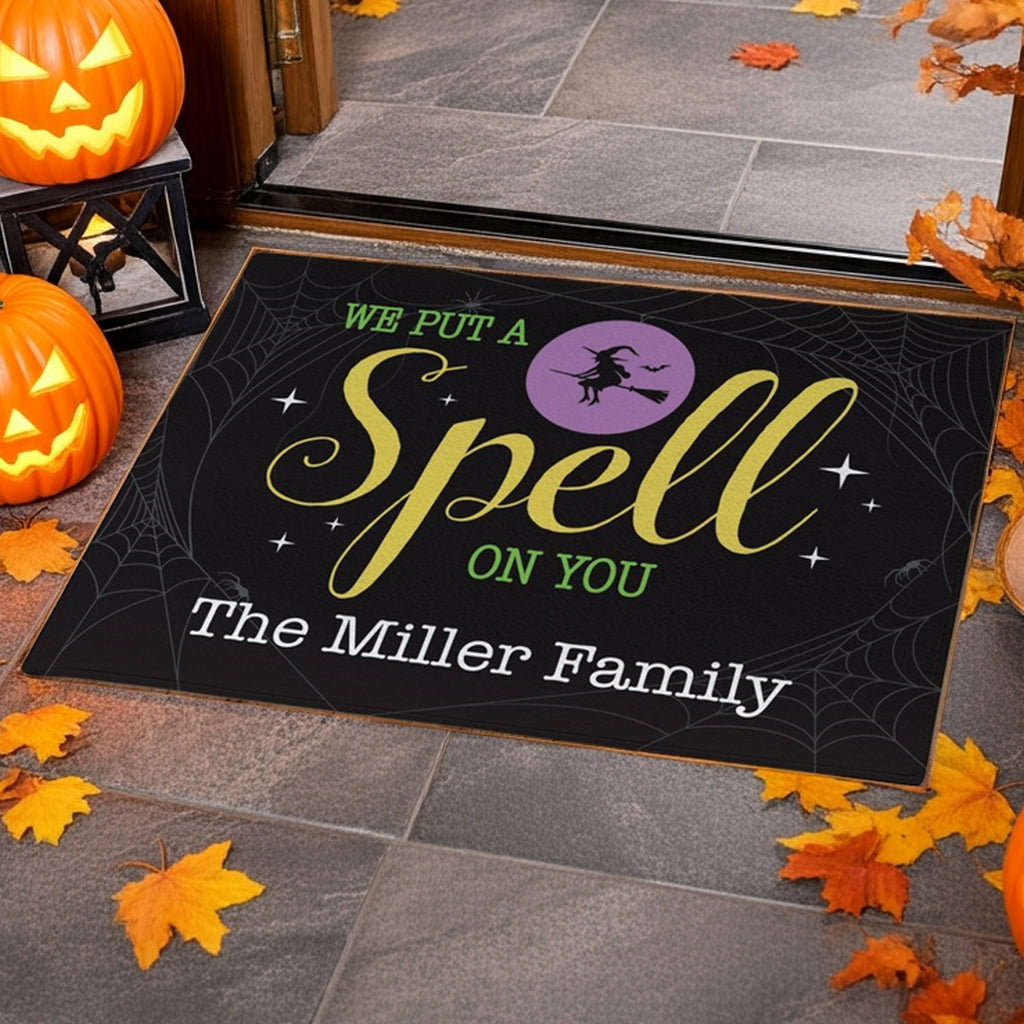 Personalized halloween doormat with we put a spell on you text and witch design