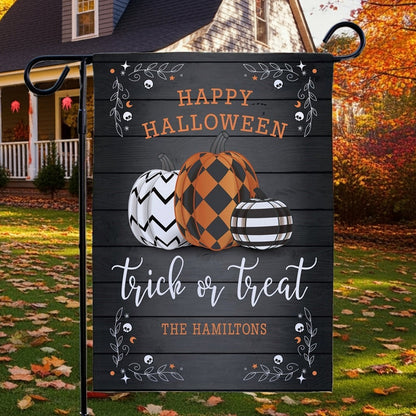 Halloween garden flag personalized with patterned pumpkins Happy Halloween trick or treat and family name