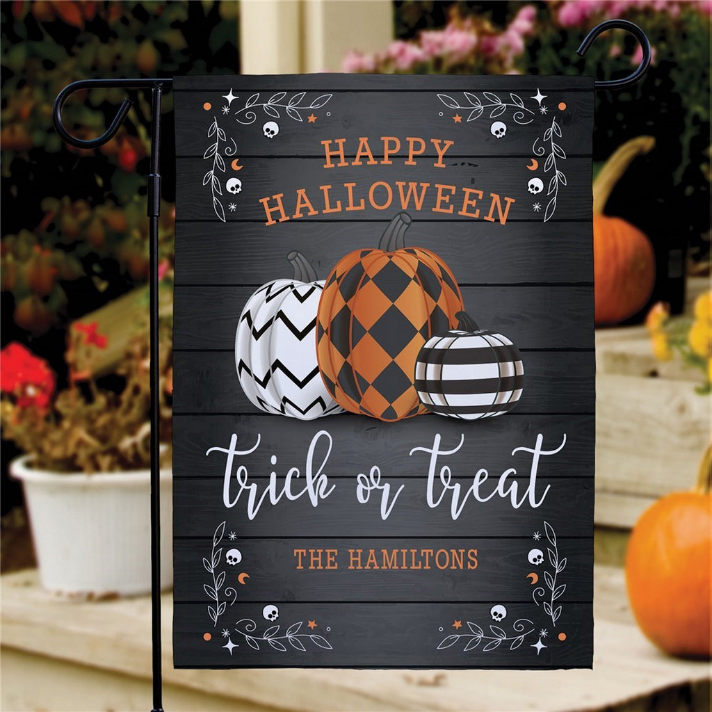 Halloween garden flag custom printed with three patterned pumpkins Happy Halloween text