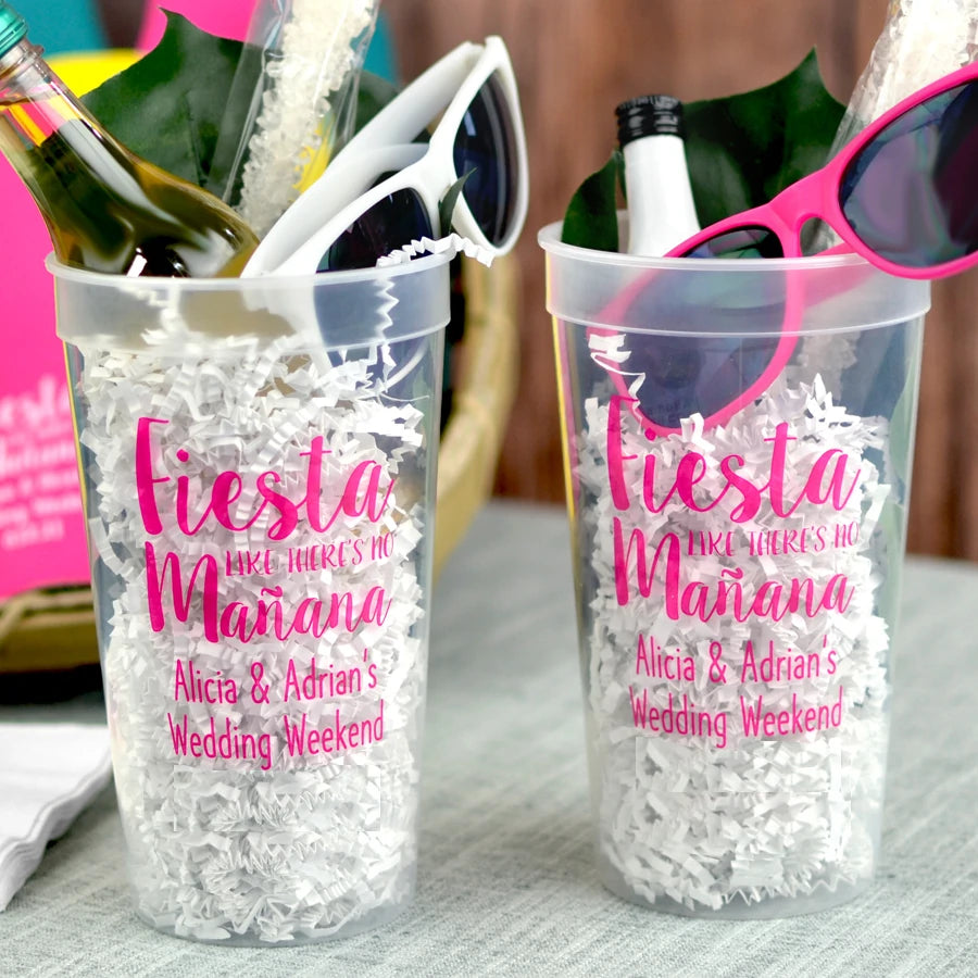 Clear 32 oz. wedding favor cups personalized with fiesta like no manana design and 2 lines of custom text in hot pink rhodamine print
