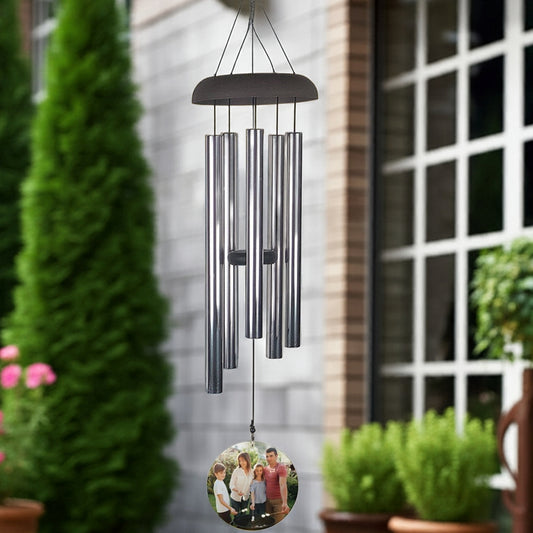 Personalized photo memorial wind chime with metal tubes and custom photo hanging outside