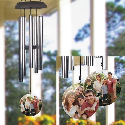 Personalized photo wind chime with silver tubes and custom family photo wind sail hanging outdoors