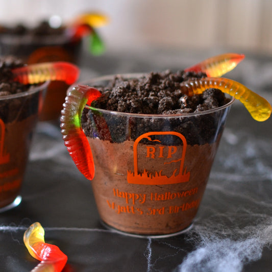 Personalized clear Halloween tumber cups filled with dirt pudding dessert for Halloween party