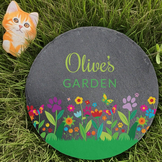 Personalized round slate pet memorial garden stone with colorful flowers and paw prints