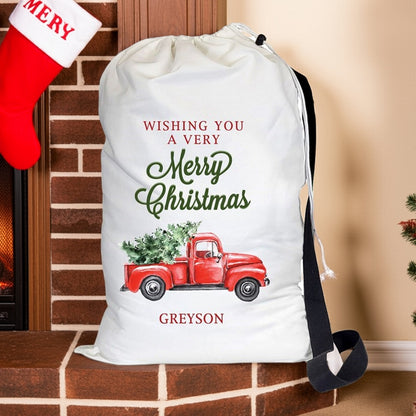 Personalized Santa sack with red truck design for Christmas gifts and holiday cheer