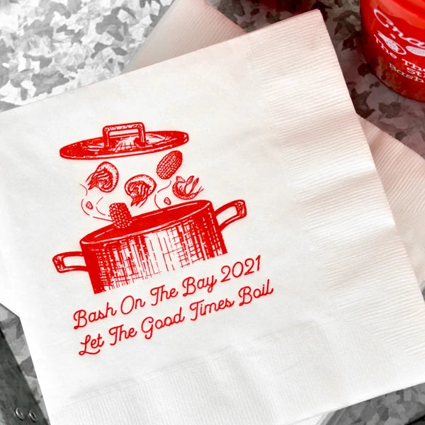 White summer party luncheon napkins personalized  with crawfish boil design and 2 lines of text in red print