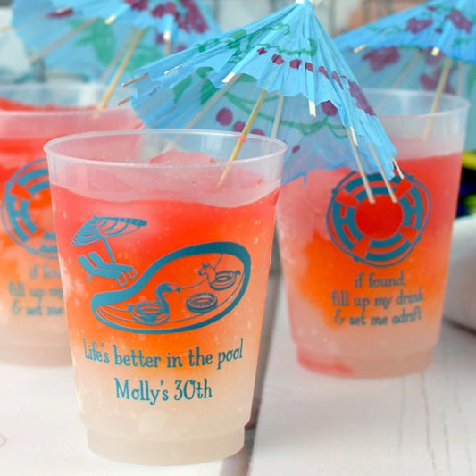 16 oz clear frosted party cups personalized with poolside design and custom text on front side and lifesaver design and custom text on back side in turquoise print for summer pool party