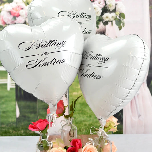 White heart shape wedding balloons personalized with custom monogram in black print