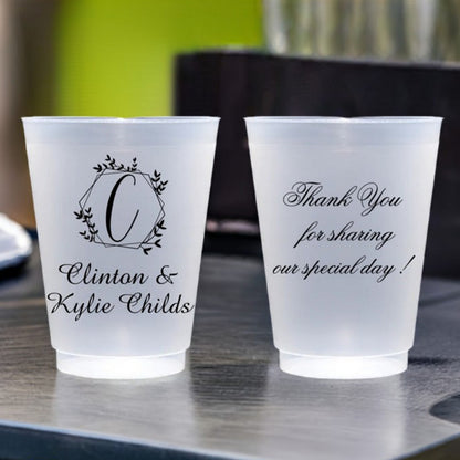 Personalized wedding cups featuring elegant script with names and a thank you message for guests