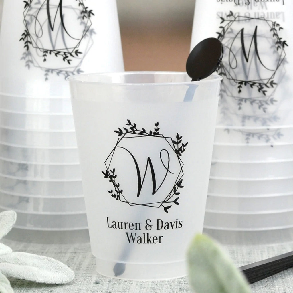Personalized wedding cups featuring floral design and custom names for memorable celebrations