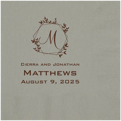 silver paper wedding dinner napkin personalized with geometric initial monogram and 3 lines of custom text in chocolate brown print