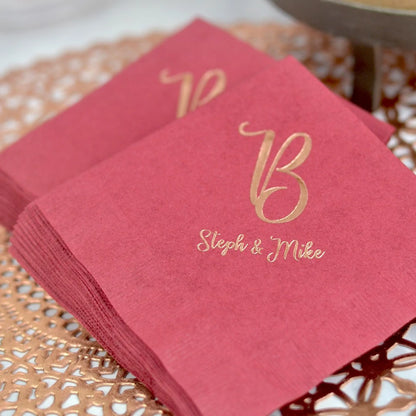 burgundy wedding luncheon napkins personalized with single initial b and bride and groom name in gold print