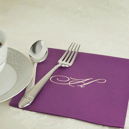 Aubergine color linen feel luncheon napkin personalized with single initial mongram for wedding reception