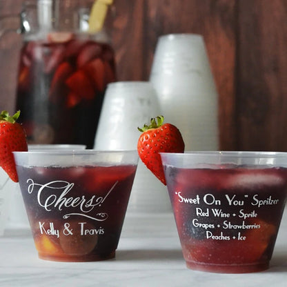 9 oz clear frosted wedding cocktail cups personalized with cheers design and custom text on front side and custom text on back side in white print