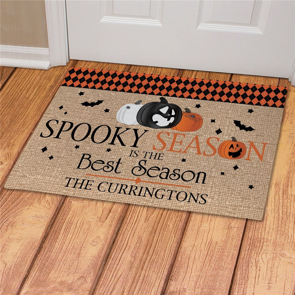 Pumpkins and bats personalized doormat with spooky season design and custom family name