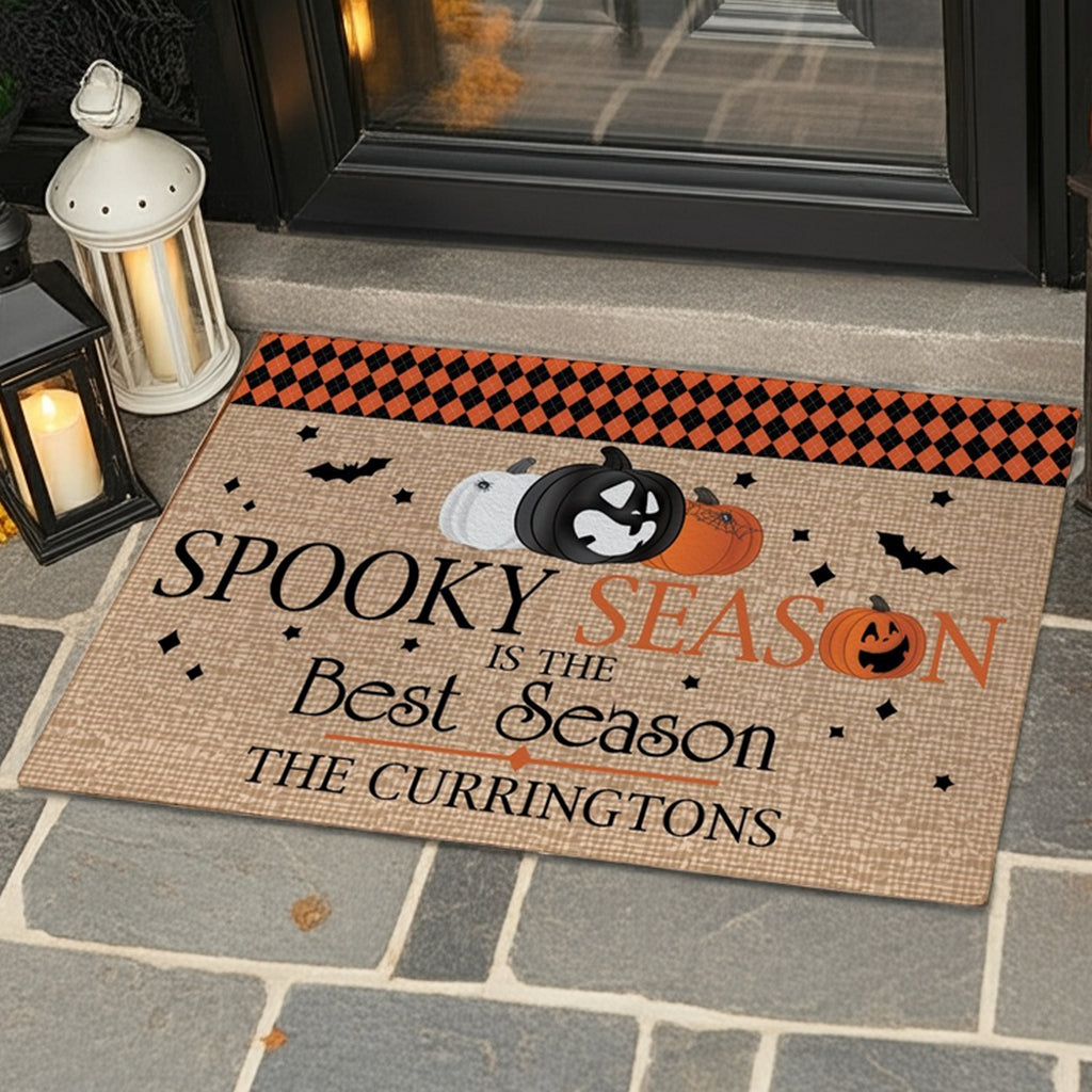 Pumpkins and bats personalized Halloween doormat with spooky season design and custom family name
