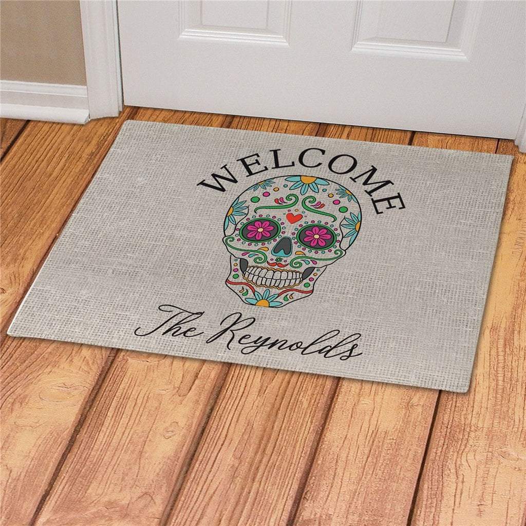 Sugar skull personalized doormat with colorful skull and custom family name on beige background