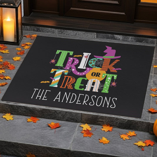 Trick or treat personalized Halloween doormat with colorful design and custom family name
