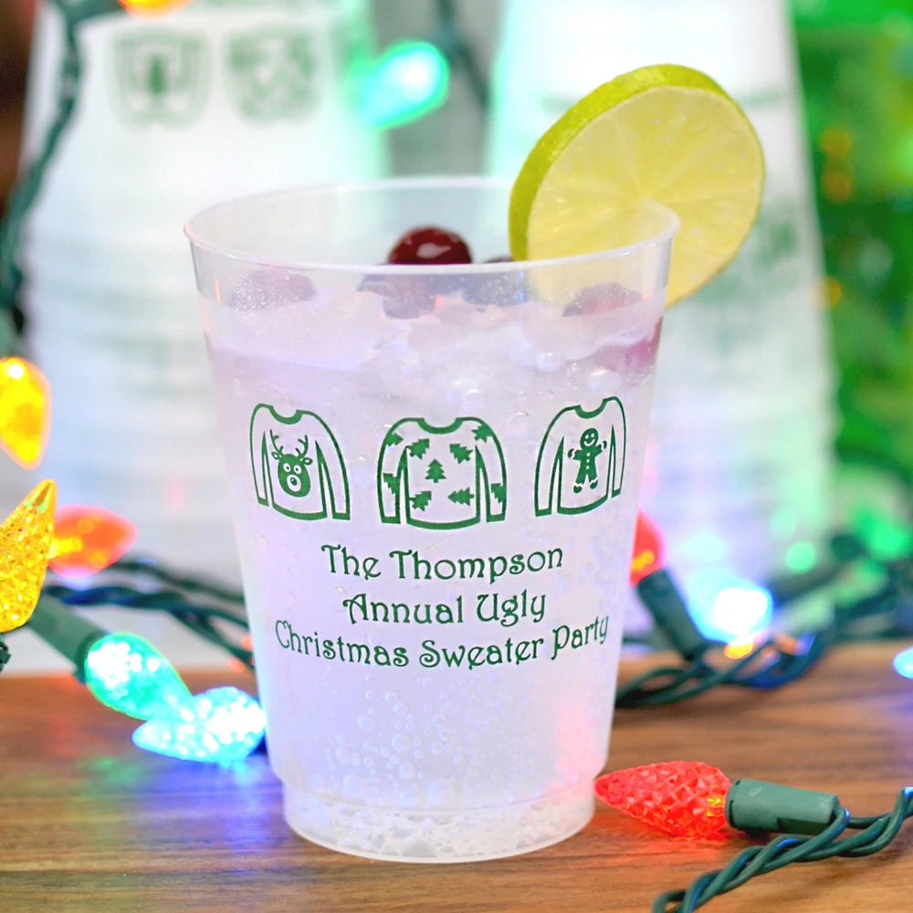 clear frosted christmas party cups personalized with ugly sweater christmas design and custom text in green print