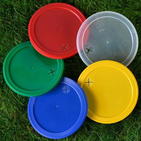 Reusable plastic snap-on lids with straw holes for 16 and 22 ounce sized plastic stadium cups