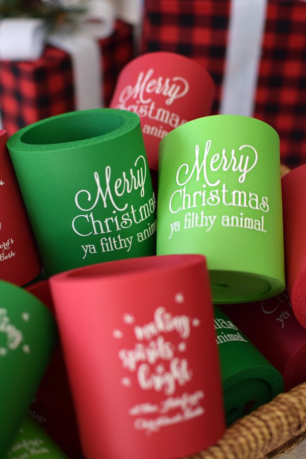 Green and Red Arctic Foam soft foam beer and soda can coolers personalized which christmas designs and custom text in white imprint color for Christmas party favors